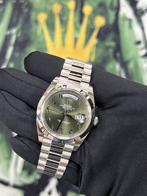 rolex day date platinum olive green arabic dial|rolex 228206 day date.